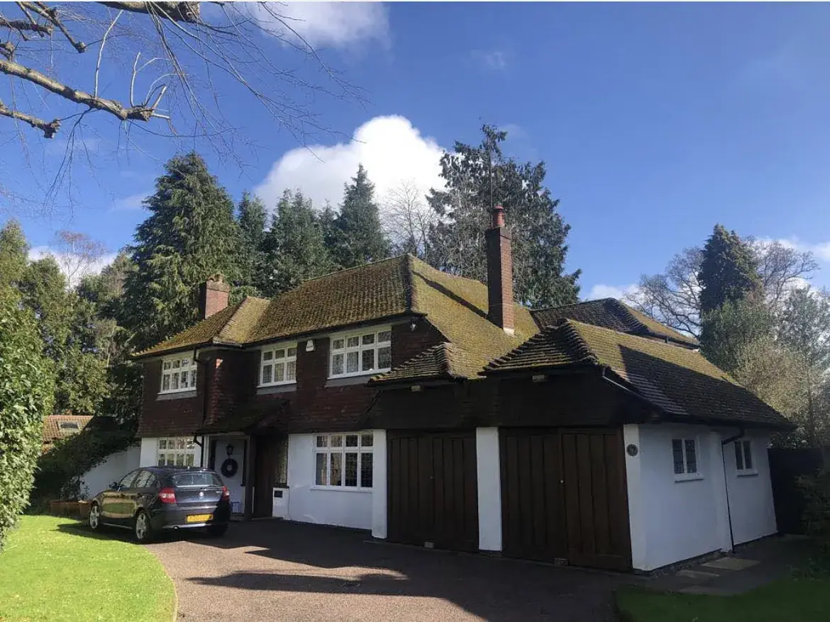 Roof cleaning by Geyserclean in Milton Keynes, before treatment