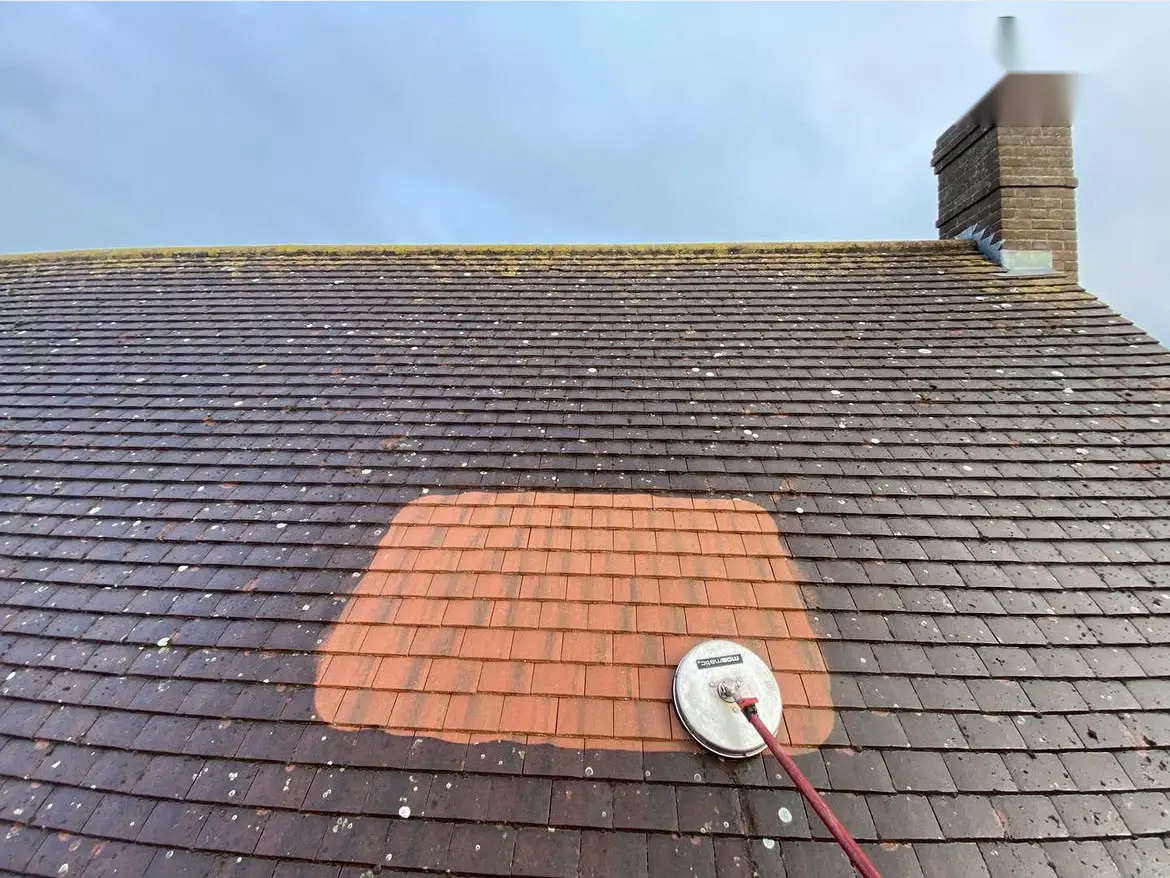 Roof cleaning by Geyserclean in Milton Keynes, work in progress
