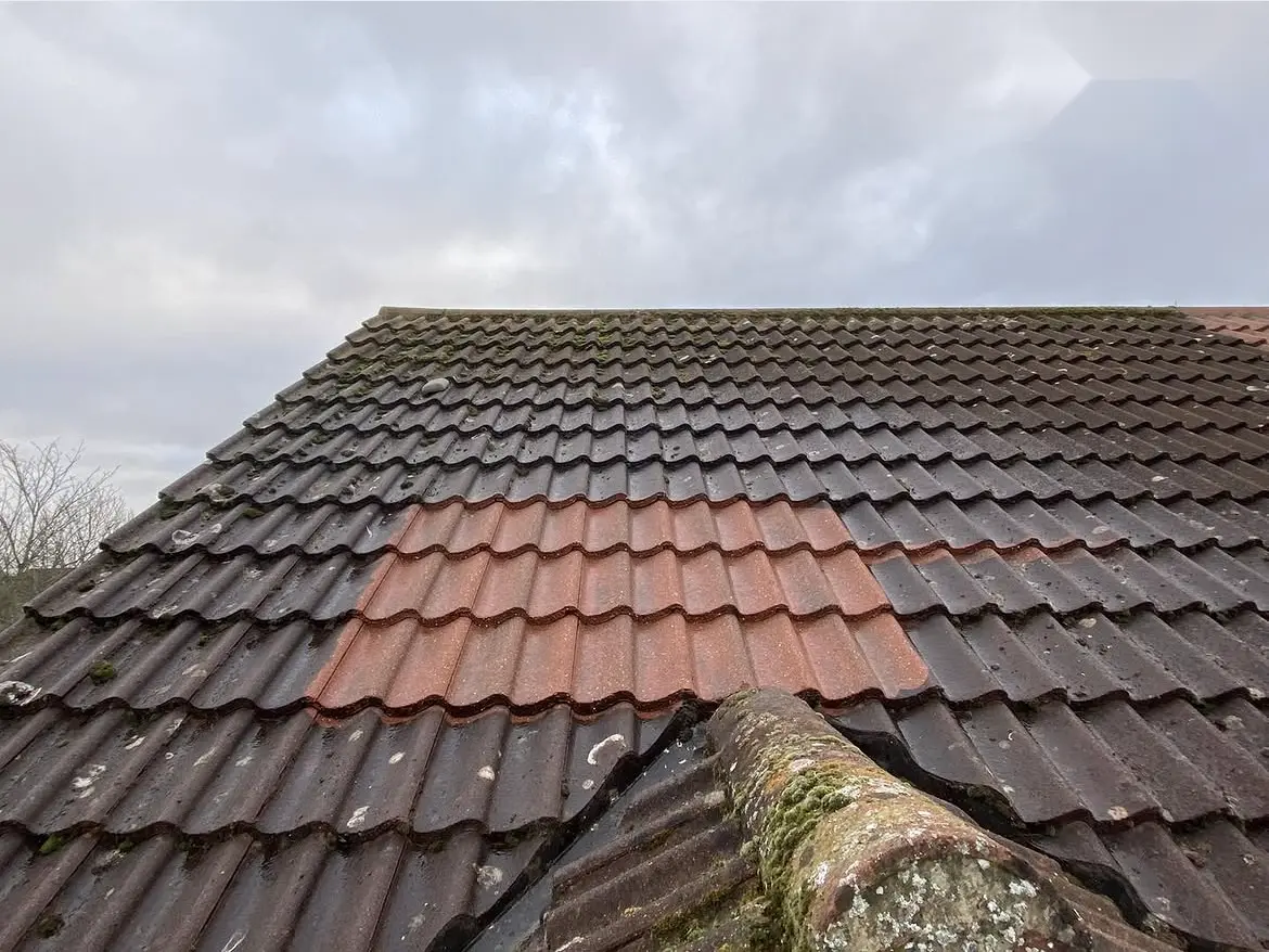 Roof cleaning by Geyserclean in Milton Keynes, work in progress