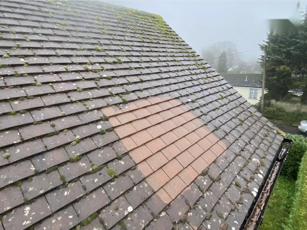 Roof cleaning by Geyserclean in Milton Keynes, work in progress
