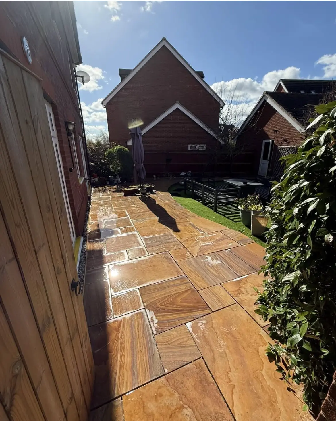 Patio cleaning by Geyserclean in Milton Keynes, work in progress
