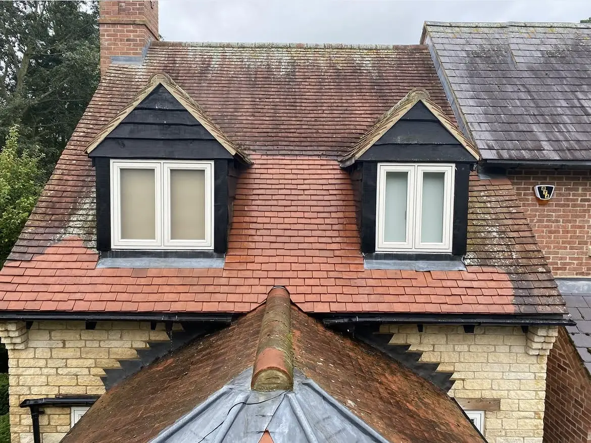Roof cleaning by Geyserclean in Milton Keynes, work in progress