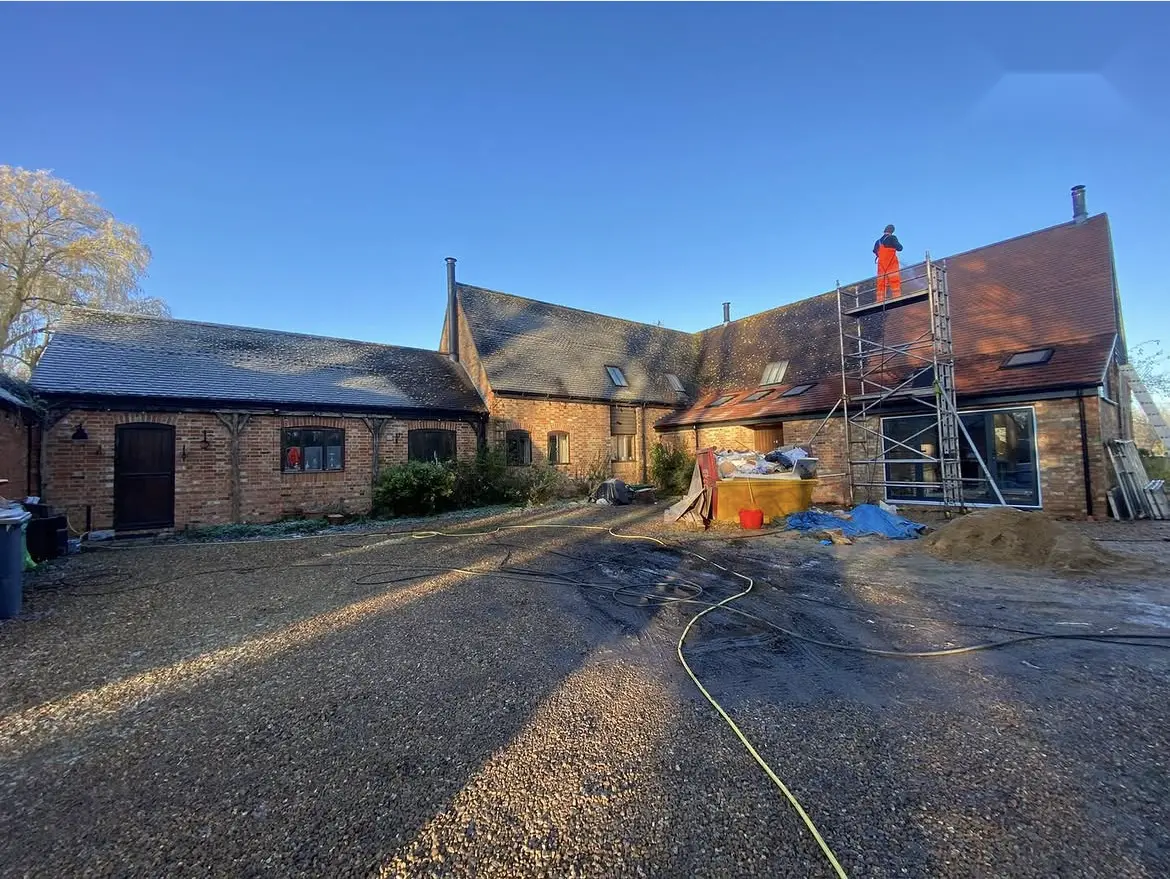 Roof cleaning by Geyserclean in Milton Keynes, work in progress